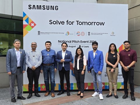 Dr. Pinaki Bhaskar, sixth from left, with the other panellists and organisers before the Solve for Tomorrow National Pitch Event 2024 banner at IIT Delhi.